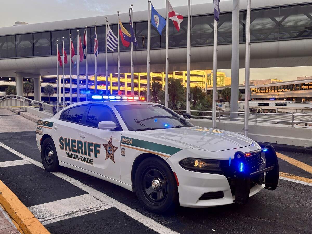 A person was detained after shooting reports at Miami International Airport; terminals and departure areas were closed as Miami-Dade deputies flooded the area.